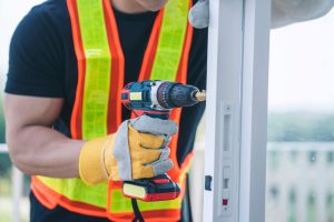 A cordless drill in use in an industrial setting