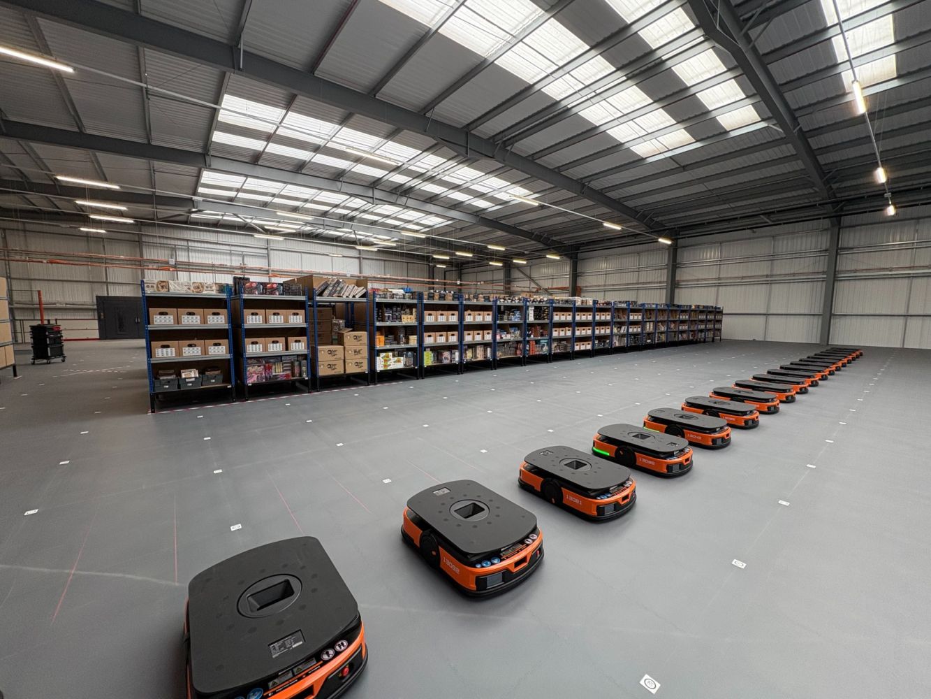 Next Rails Warehouse Autrix warehouse automation boosts order volume for tabletop games ...