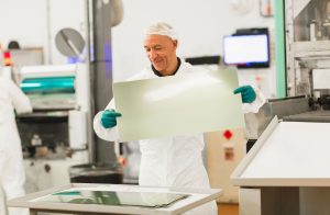 What are the main differences between chemical etching and other metal shaping methods?
