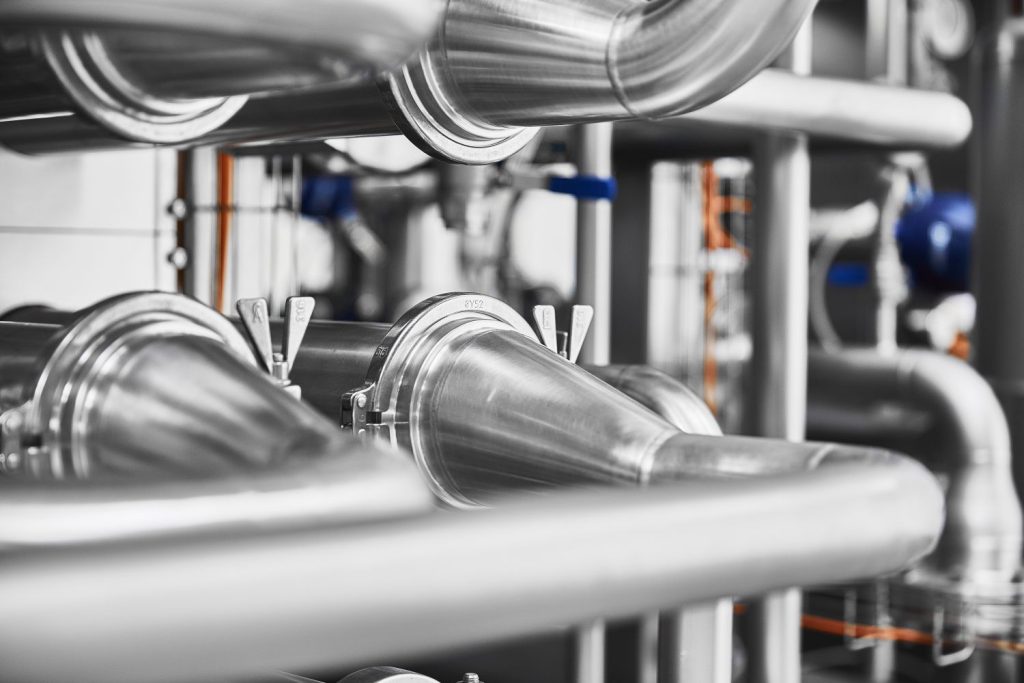 What is the role of heat exchangers in AF brewing?